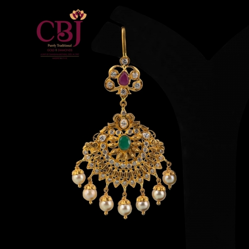 Antique cz tikka featuring rubies, emeralds and pearls.