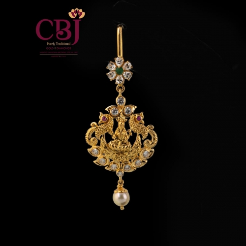 CZ Maang tikka featuring a contrast between gold and CZ stones, with deity in the middle.