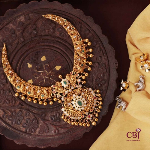 A CZ Pachi necklace that offers a stone-studded display, embellished with rubies, emeralds and CZs.