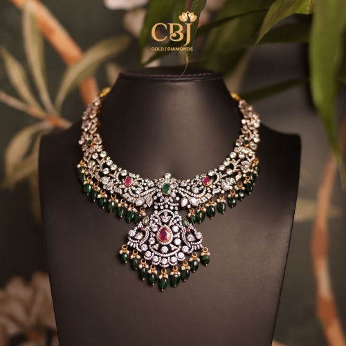 Step back in time with this gorgeous Victorian necklace crafted with shimmering CZ stones and rich emerald accents.