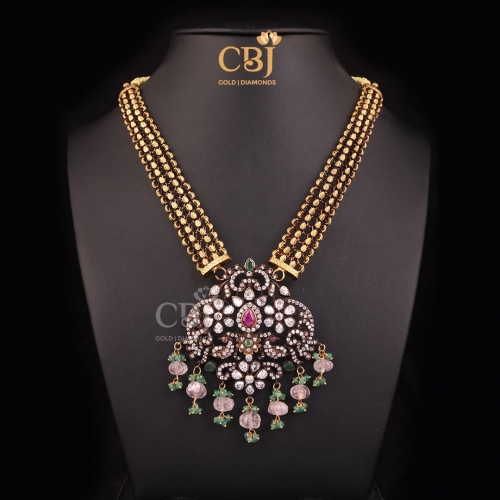 A mesmeric CZ Pachi necklace featuring Russian emerald beads and emerald stones.