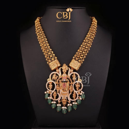 An opulent CZ Balaji necklace adorned with emerald beads.