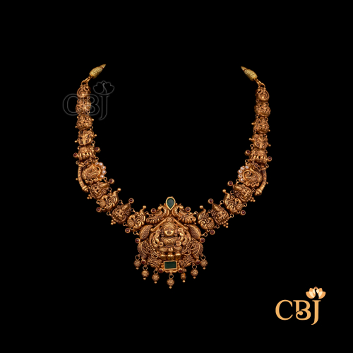 20 grams antique lightweight Nakshi Necklace displayed as a gold necklace with intricate Nakshi carvings, antique texture, and a structured neckline fit.