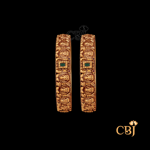 26 grams antique gold bangles set with delicate traditional patterns and a soft antique gold finish.