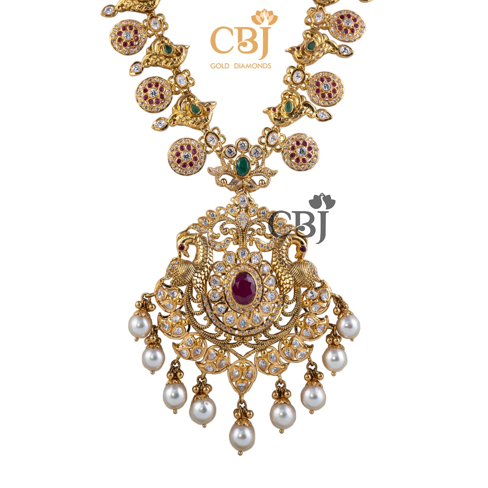 A traditional semi long CZ pachi bottumala featuring emeralds