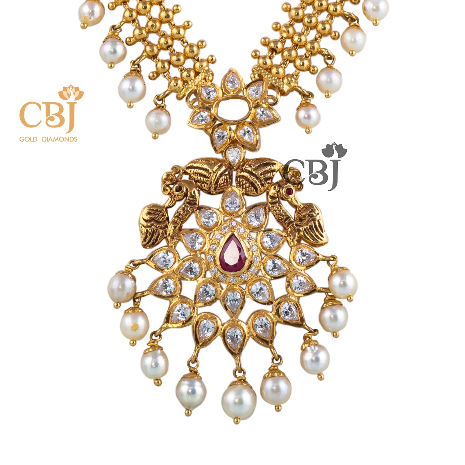 A special long necklace that highlights the CZ pachi workmanship; also featuring pearl drops.