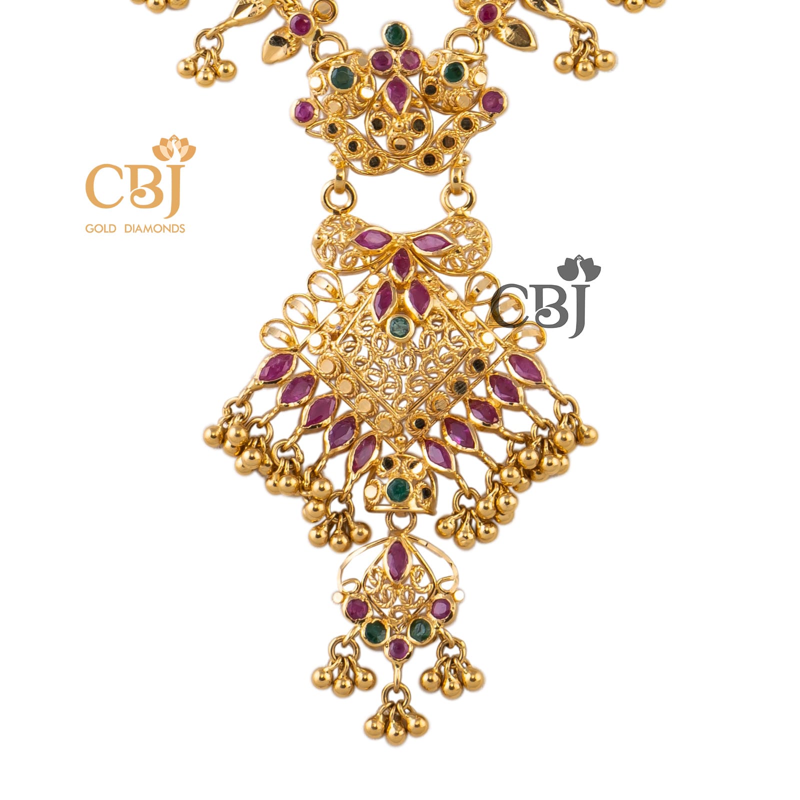 A slim and slender lightweight necklace featuring rubies and emeralds.