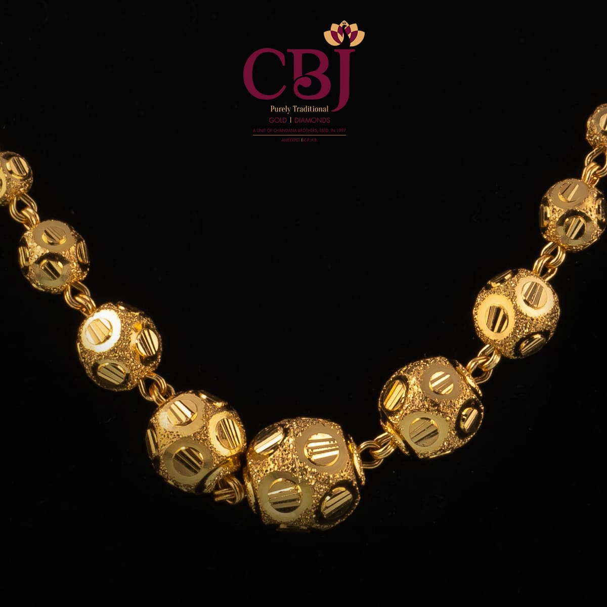 Pure 22K gold chain featuring golden balls.