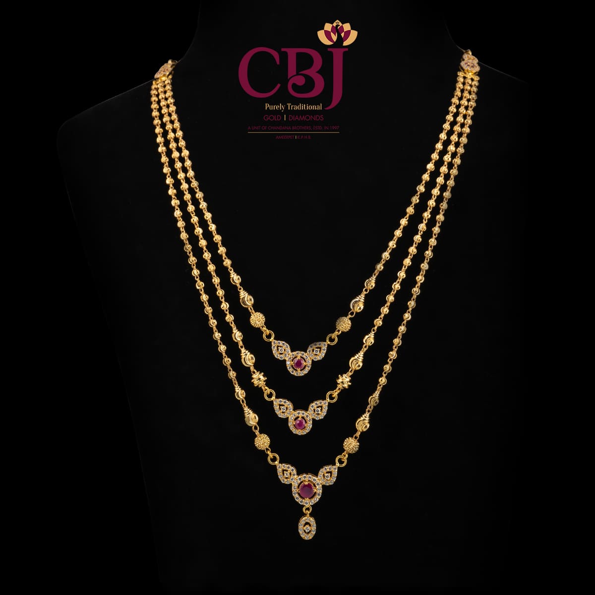 3 line ball chain necklace featuring 3 pendants/centrepiece.