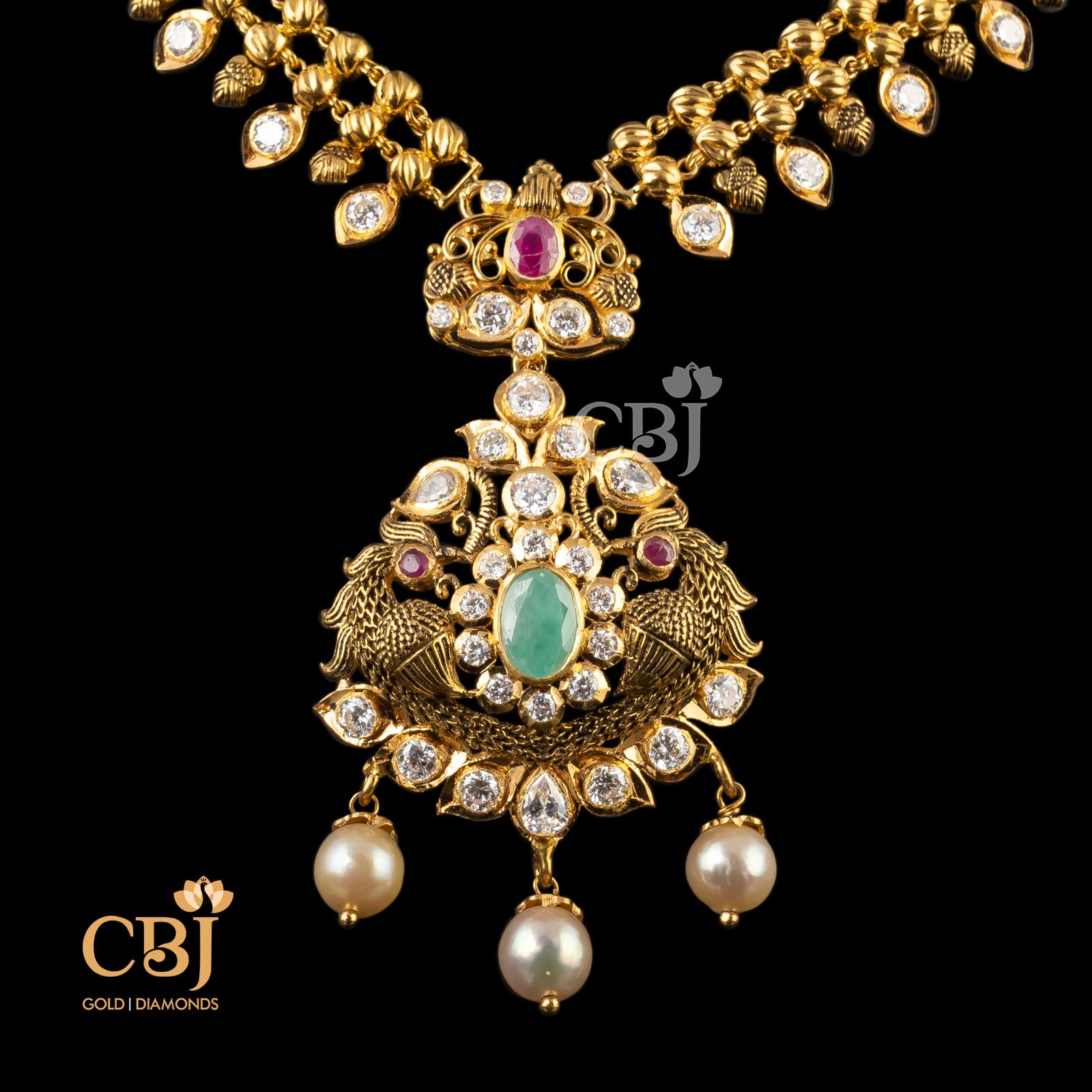 gold necklace emerald
