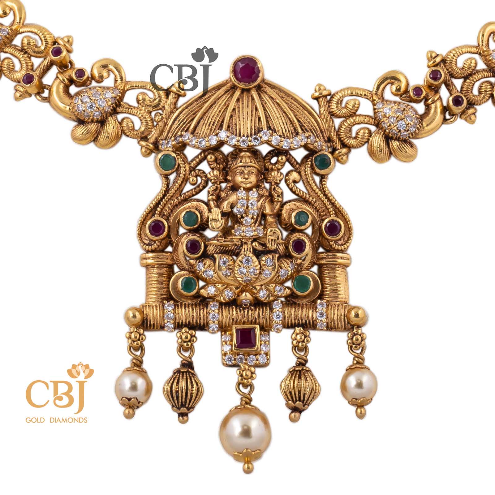 An antique Necklace featuring a gopuram in the design