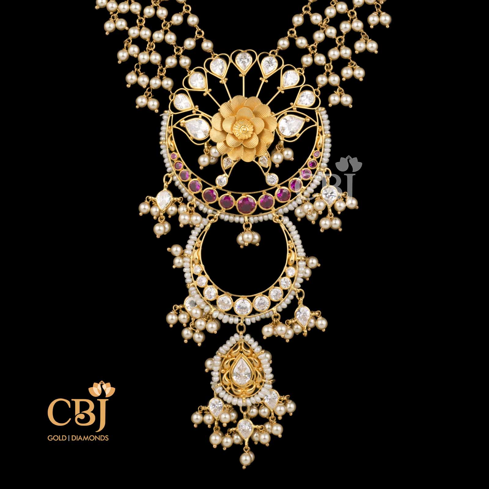 This semi long necklace featuring pearls is a designer's delight at CBJ.