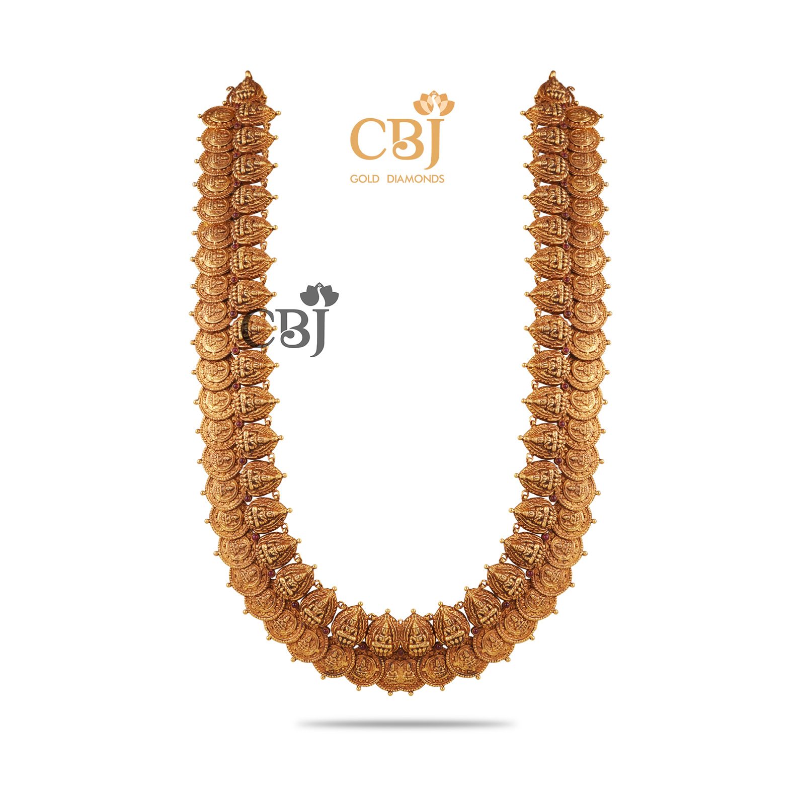 This Mahadevi Kasumala is an unparalleled precision design from the house of CBJ. Each Kasu is designed in perfect symmetry to perfectly scale the design in whole. A garland for festivals and occasion