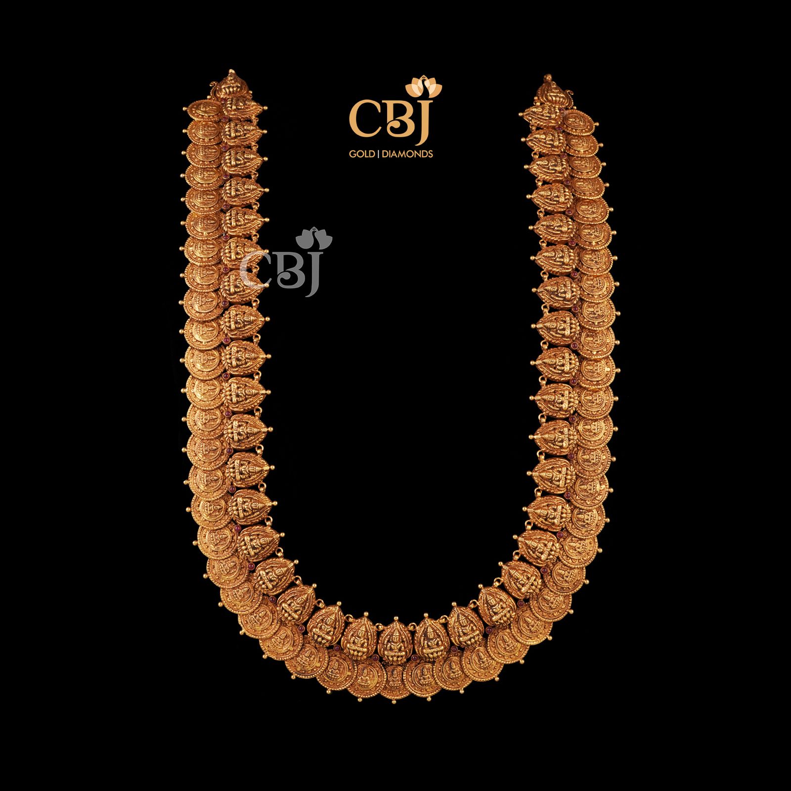 This Mahadevi Kasumala is an unparalleled precision design from the house of CBJ. Each Kasu is designed in perfect symmetry to perfectly scale the design in whole. A garland for festivals and occasion