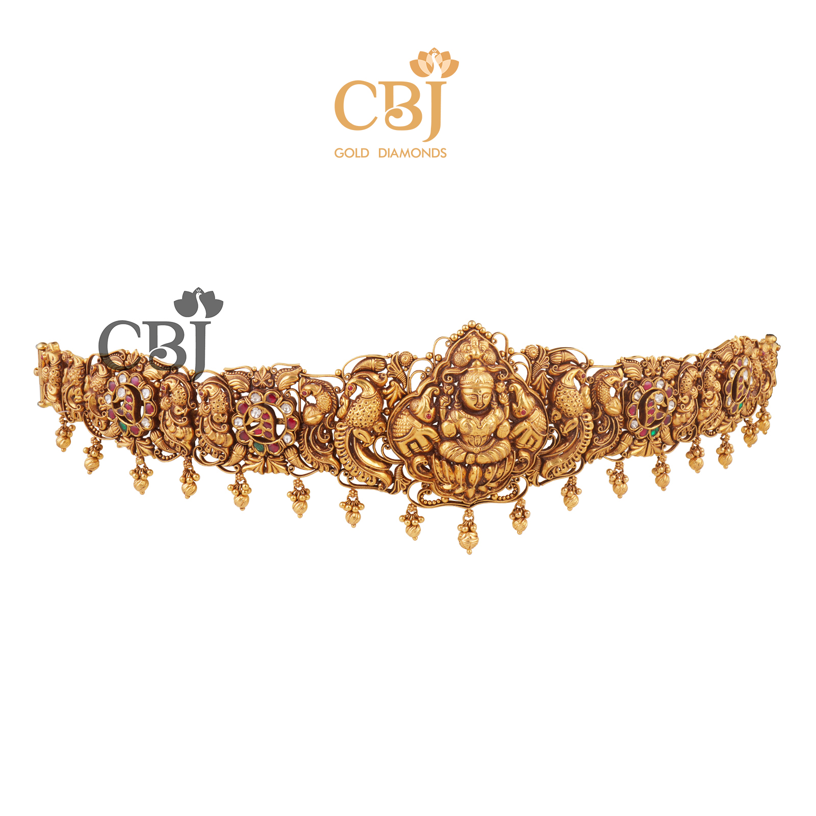 A stunning statement bridal vaddanam with an antique finish featuring kemp stones.