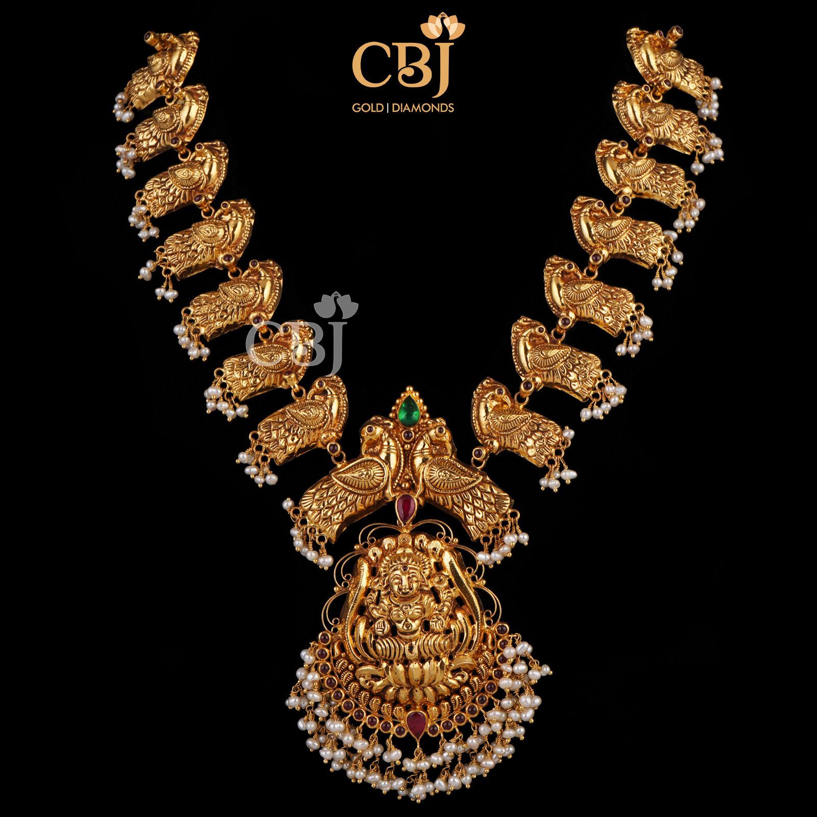 A stunning deep nakas antique necklace with a peacock design.