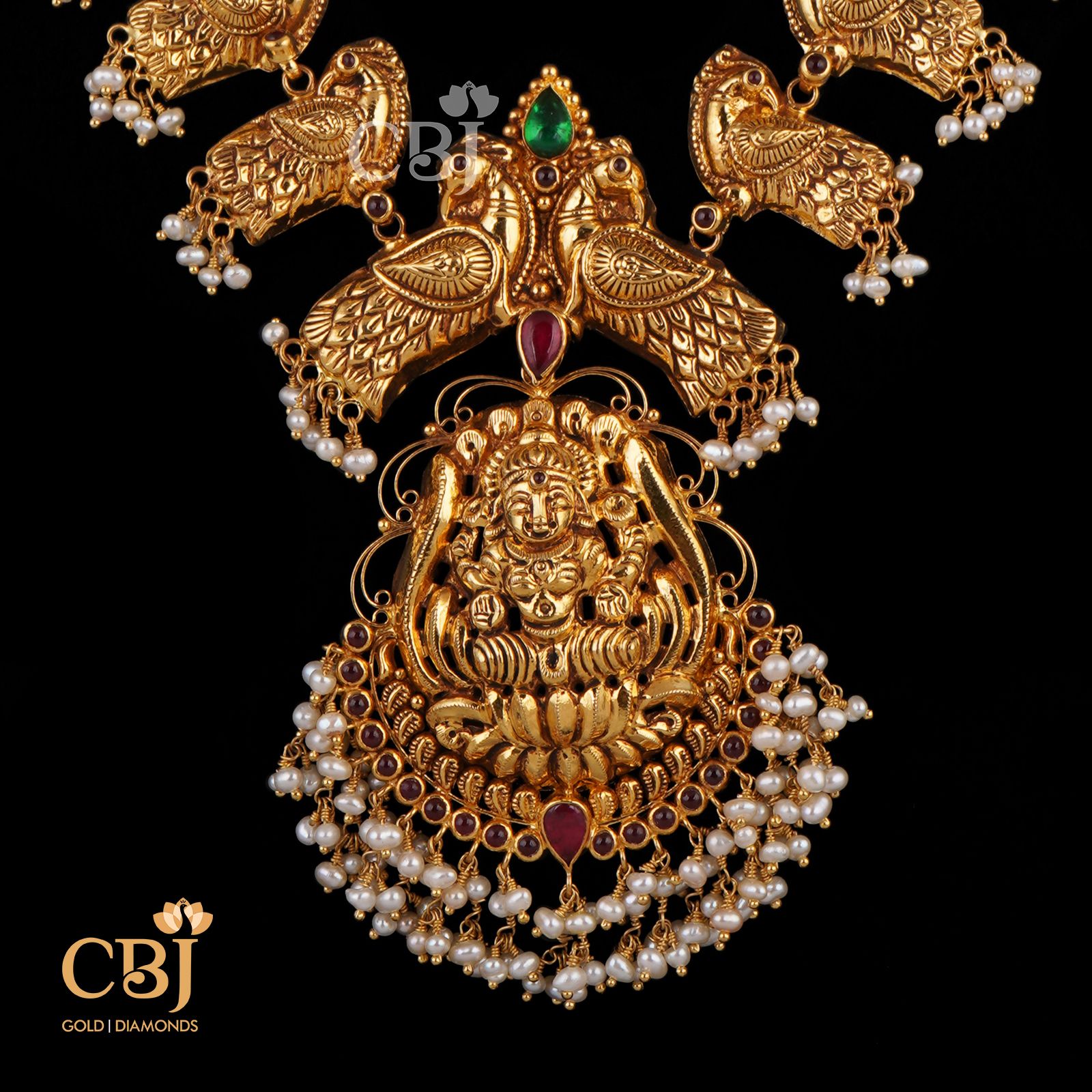 A stunning deep nakas antique necklace with a peacock design.