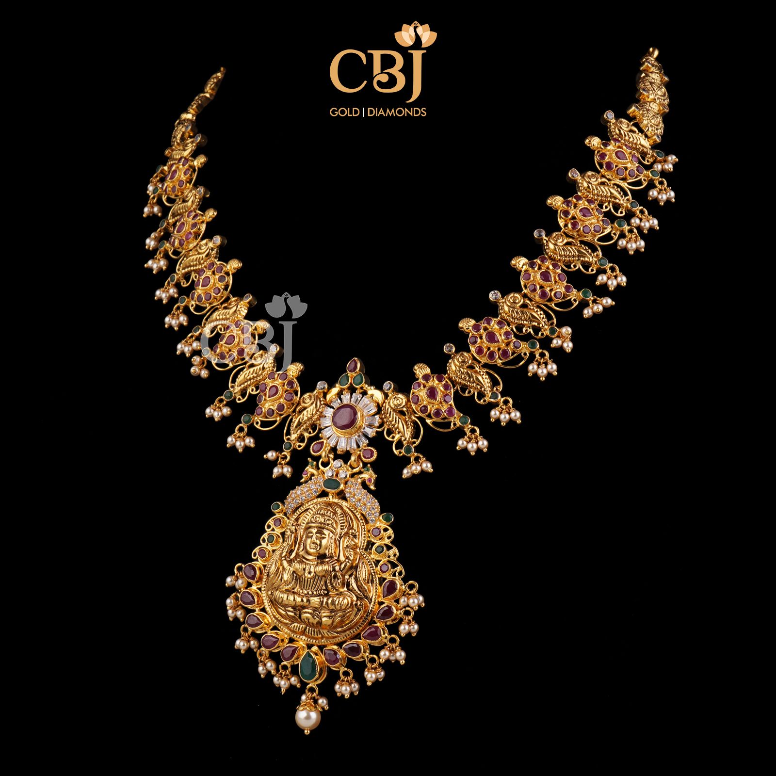 A light weight mango haram enhanced with ruby stones.
