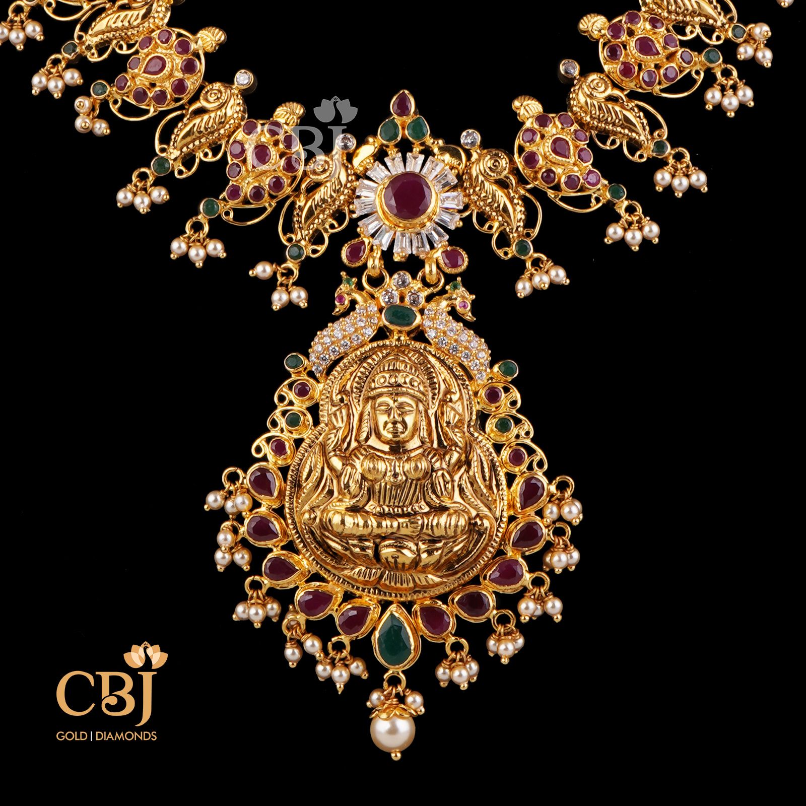 A light weight mango haram enhanced with ruby stones.