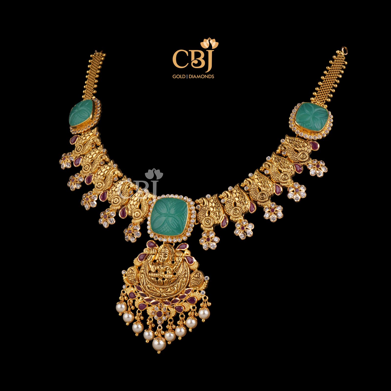 Get the attention you deserve with this bold and beautiful light weight necklace featuring emerald and ruby stones.