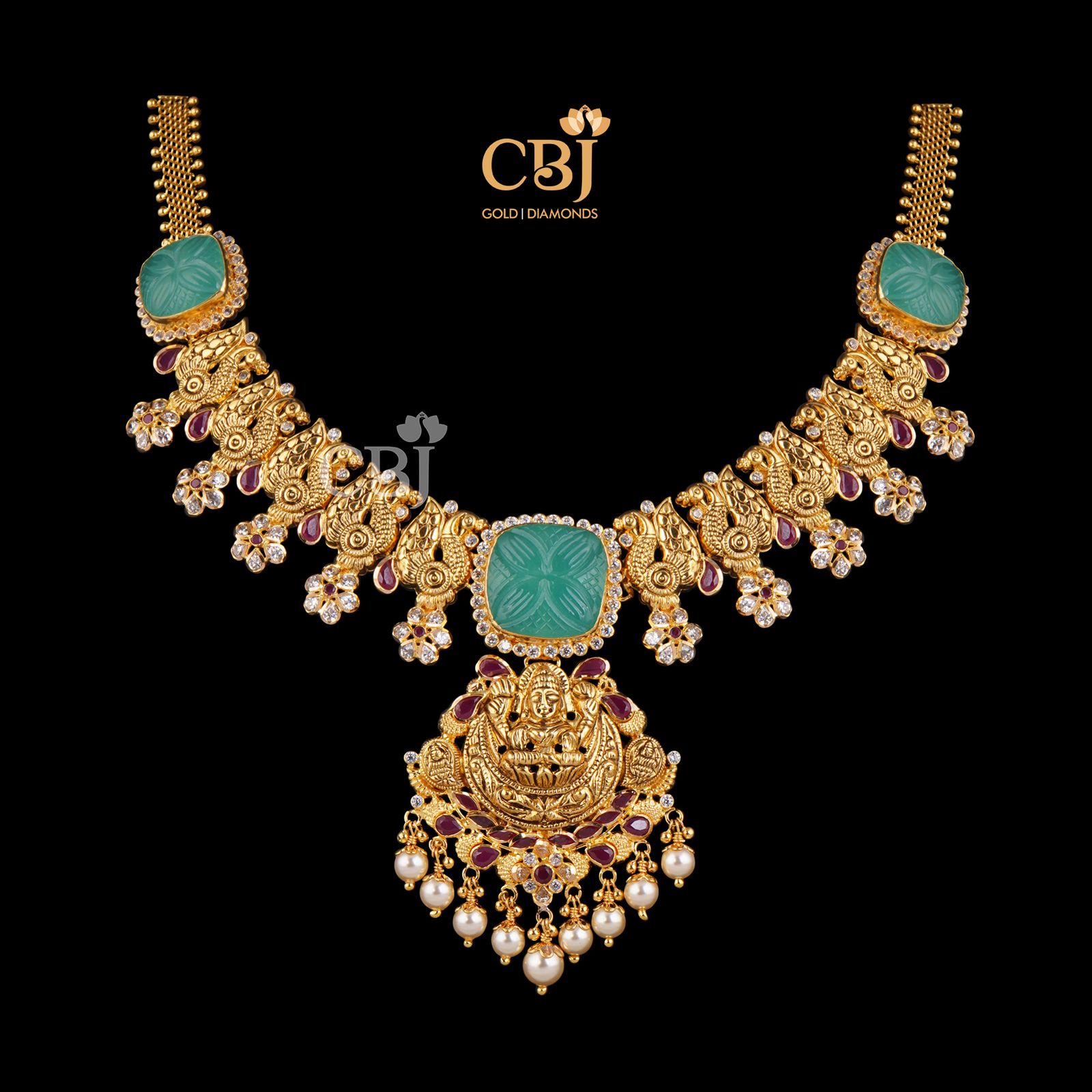 Get the attention you deserve with this bold and beautiful light weight necklace featuring emerald and ruby stones.