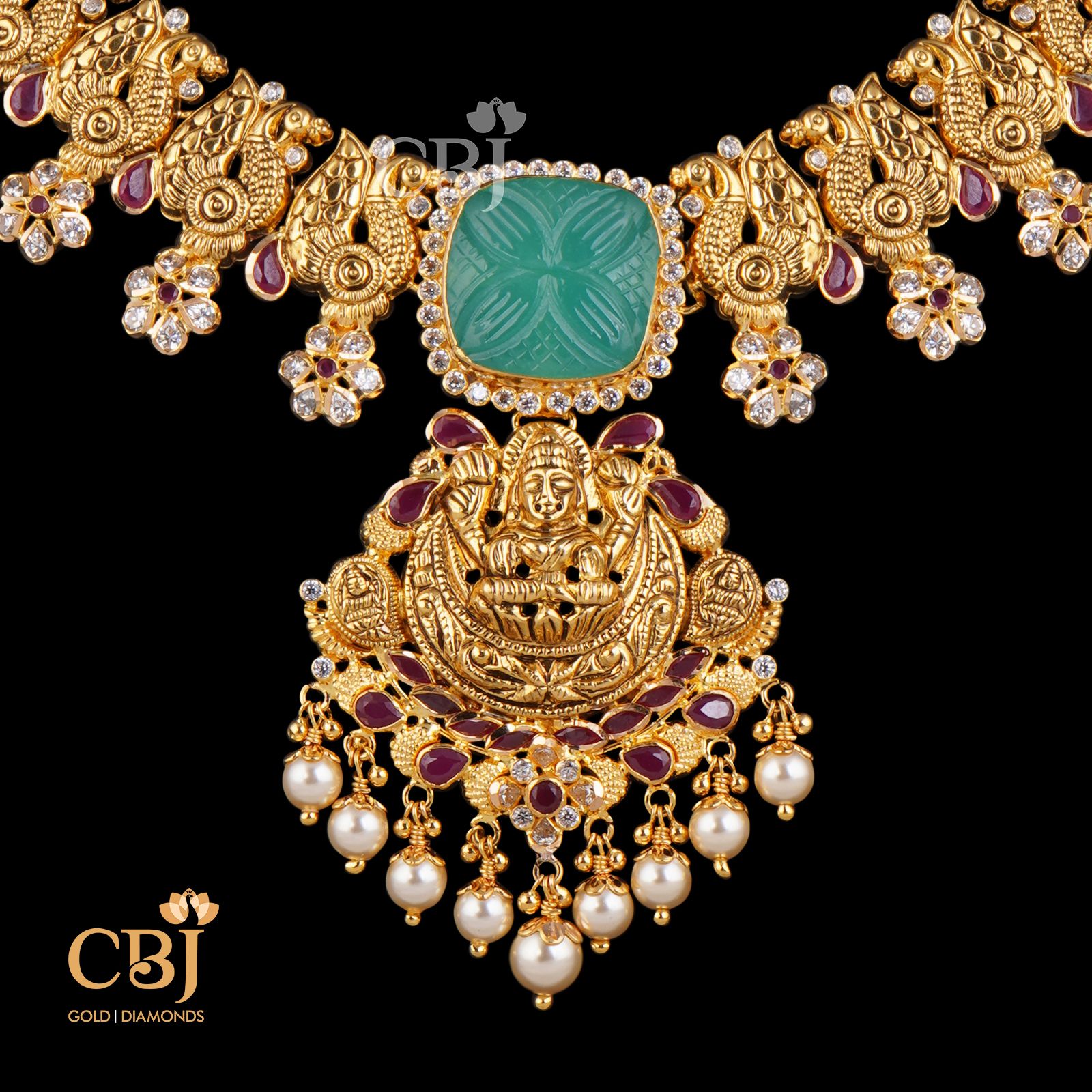 Get the attention you deserve with this bold and beautiful light weight necklace featuring emerald and ruby stones.