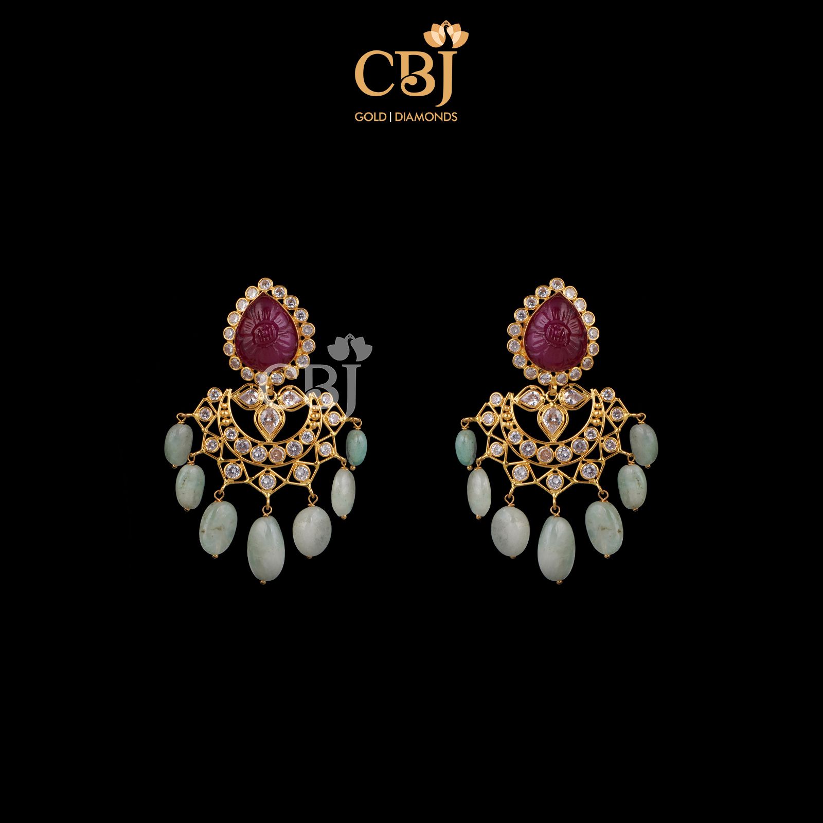 A flawless designer chandbali with ruby as the highlight stone.