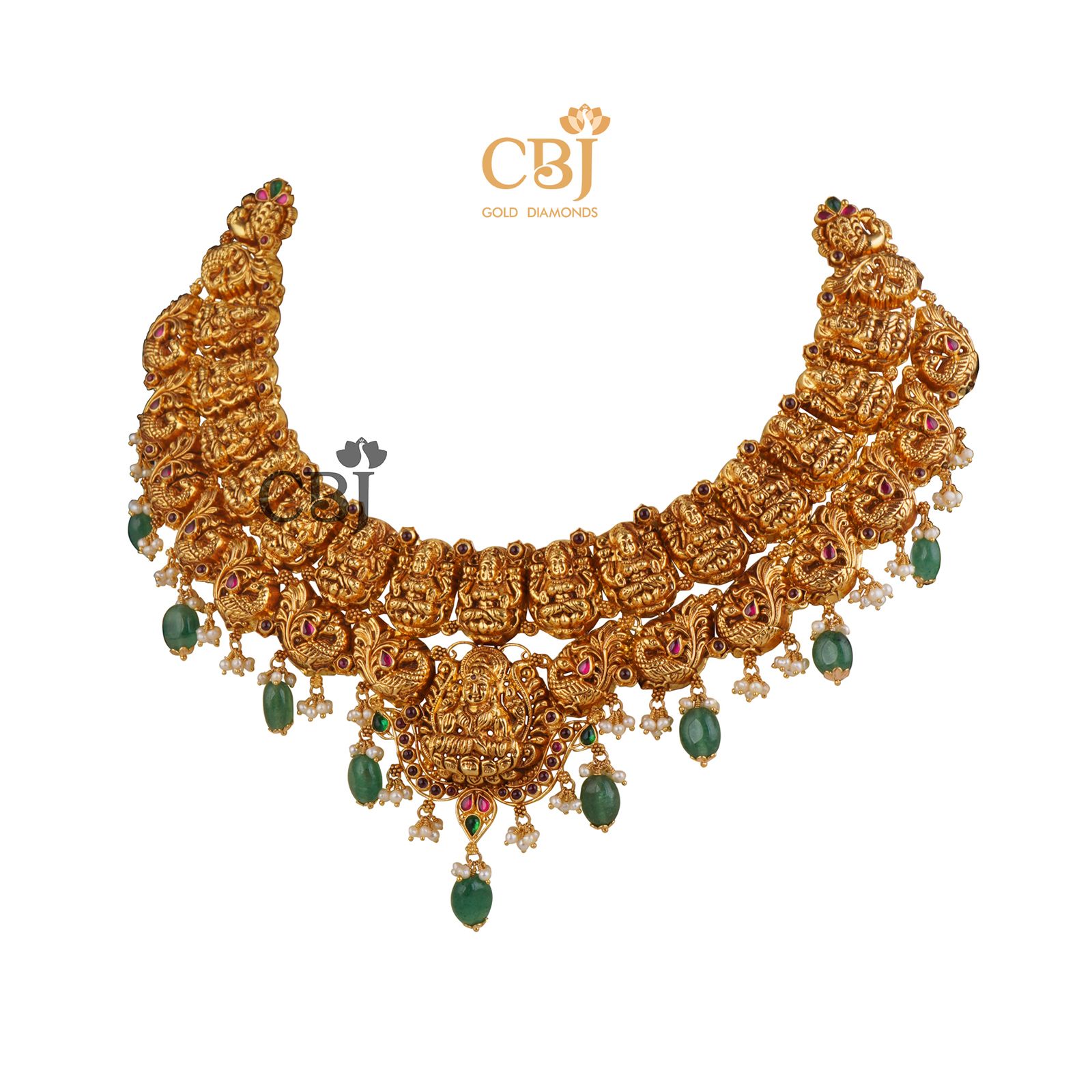 Pure 22k hold complimented by deep green hues. Nakashi necklace with Zambian emerald drops.