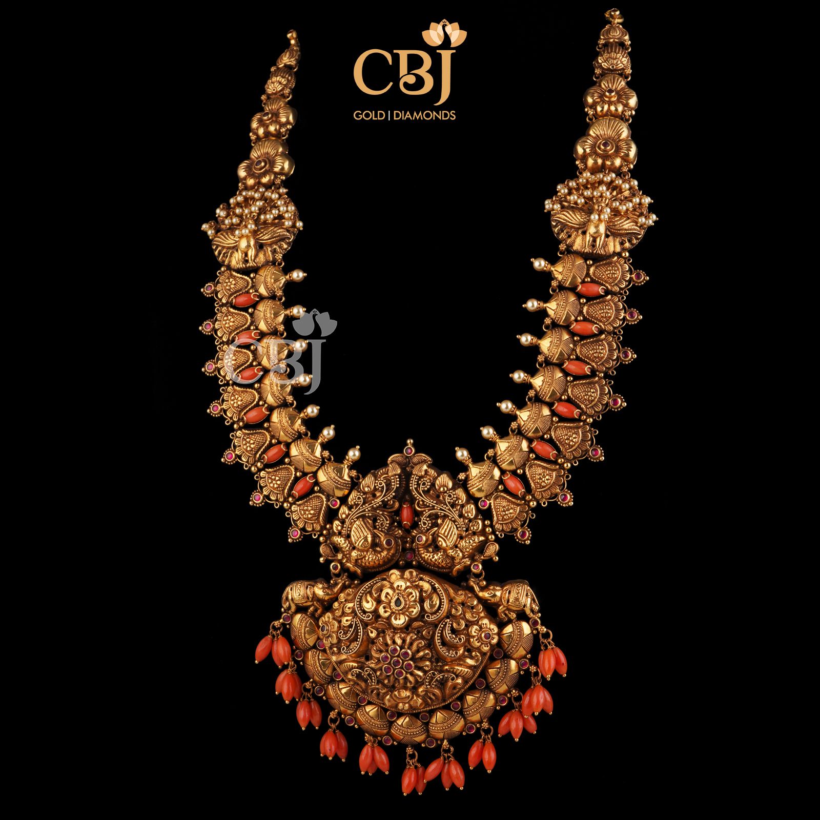 A style statement nakashi haar studded to perfection with corals for a stunning understated colour contrast.