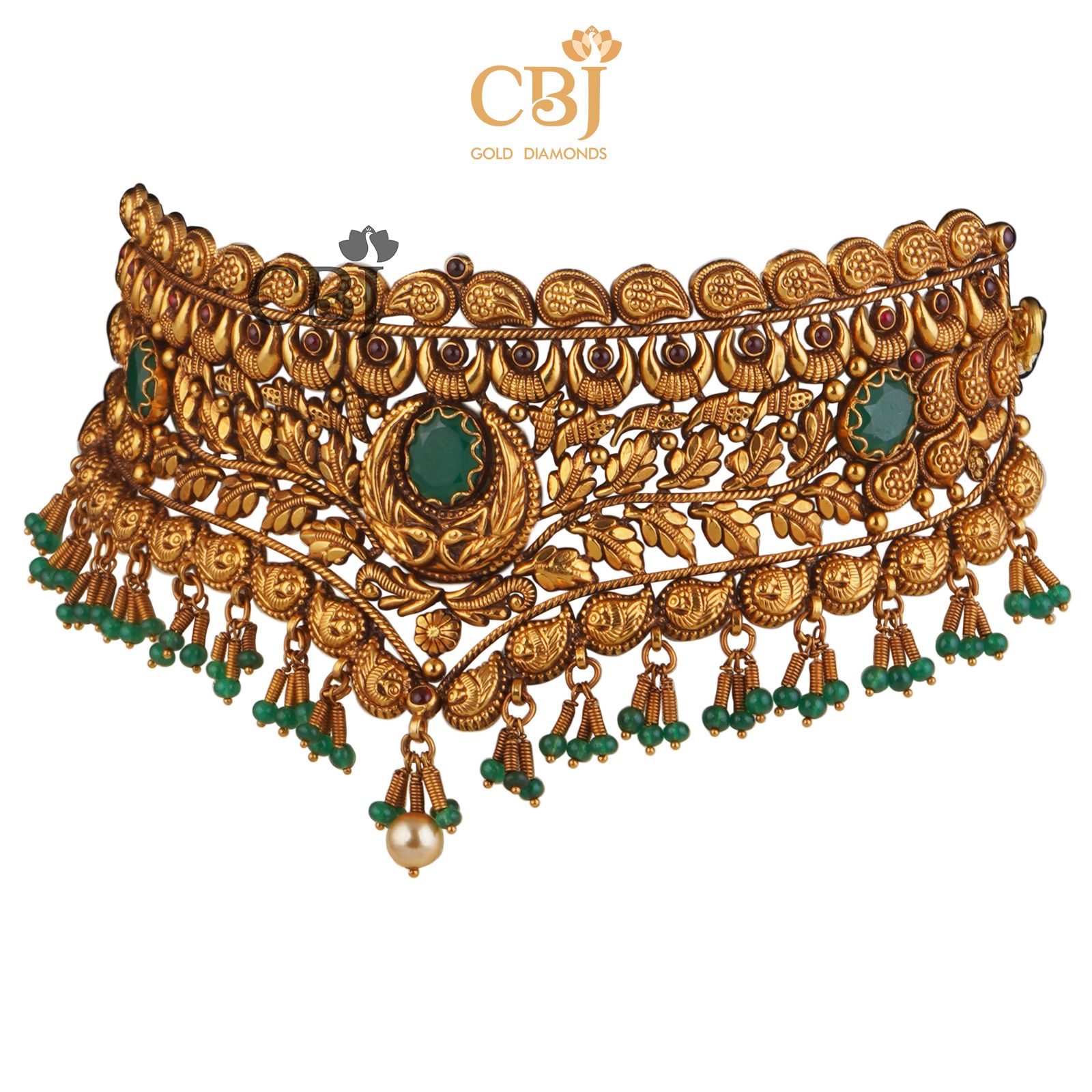 Antique nakashi designer choker enriched with stunning emerald stones.