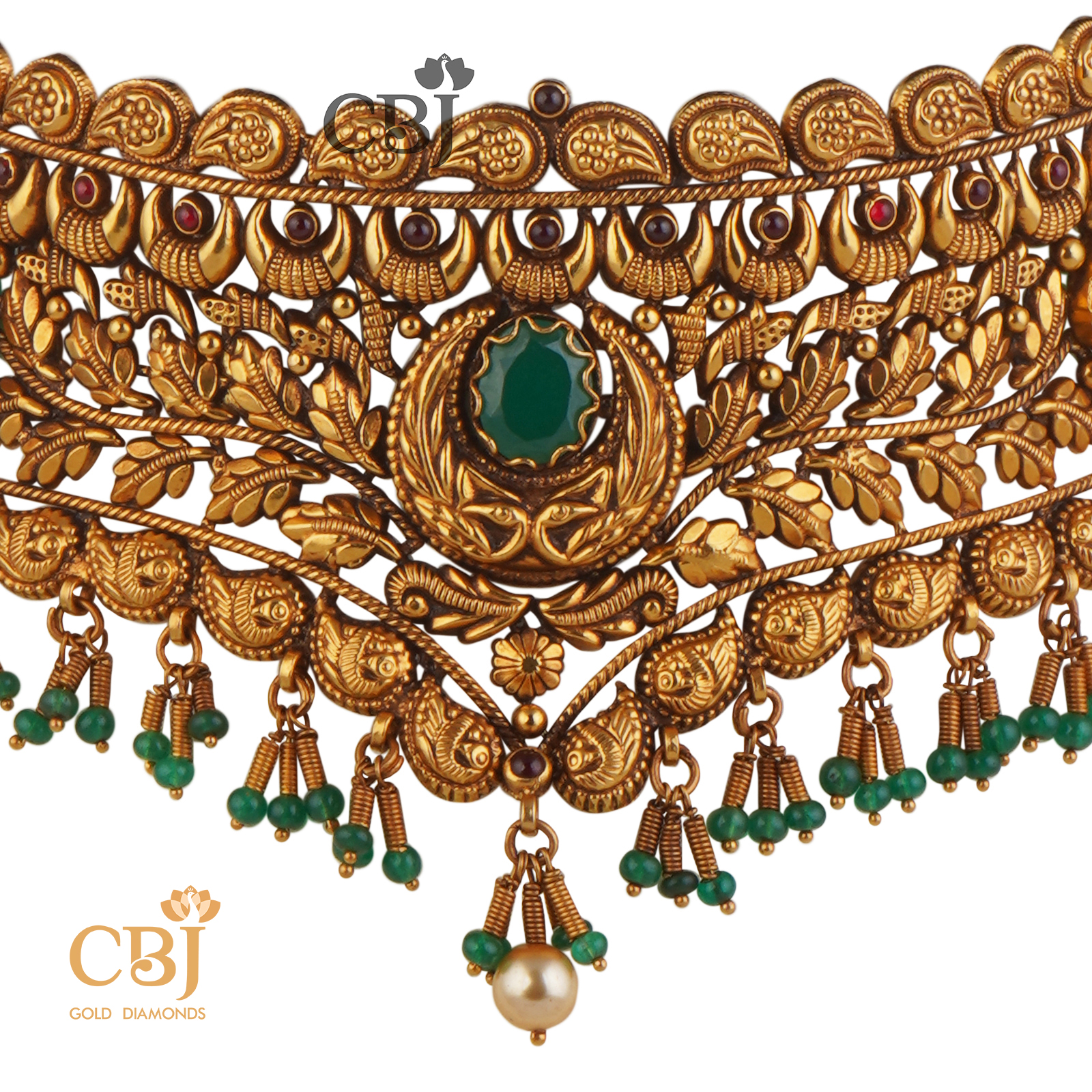 Antique nakashi designer choker enriched with stunning emerald stones.