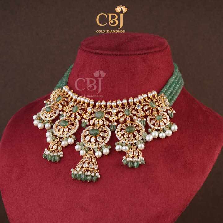 A beautiful combination of pearls and zambian emeralds elevate the look of this ultra light weight choker.