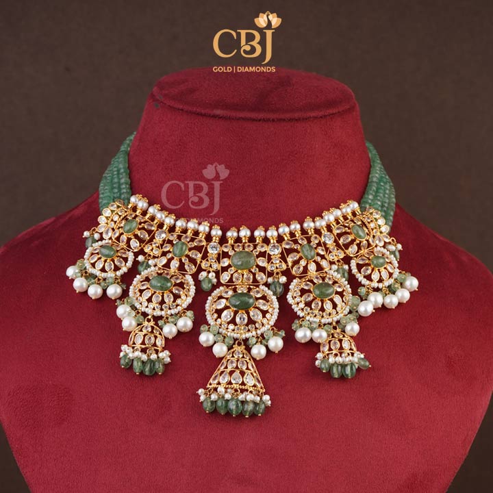 A beautiful combination of pearls and zambian emeralds elevate the look of this ultra light weight choker.