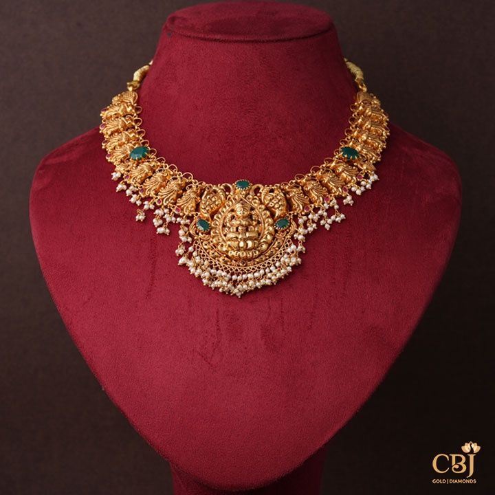 A crafty lightweight 22k gold design complimented by micro-pearls.
