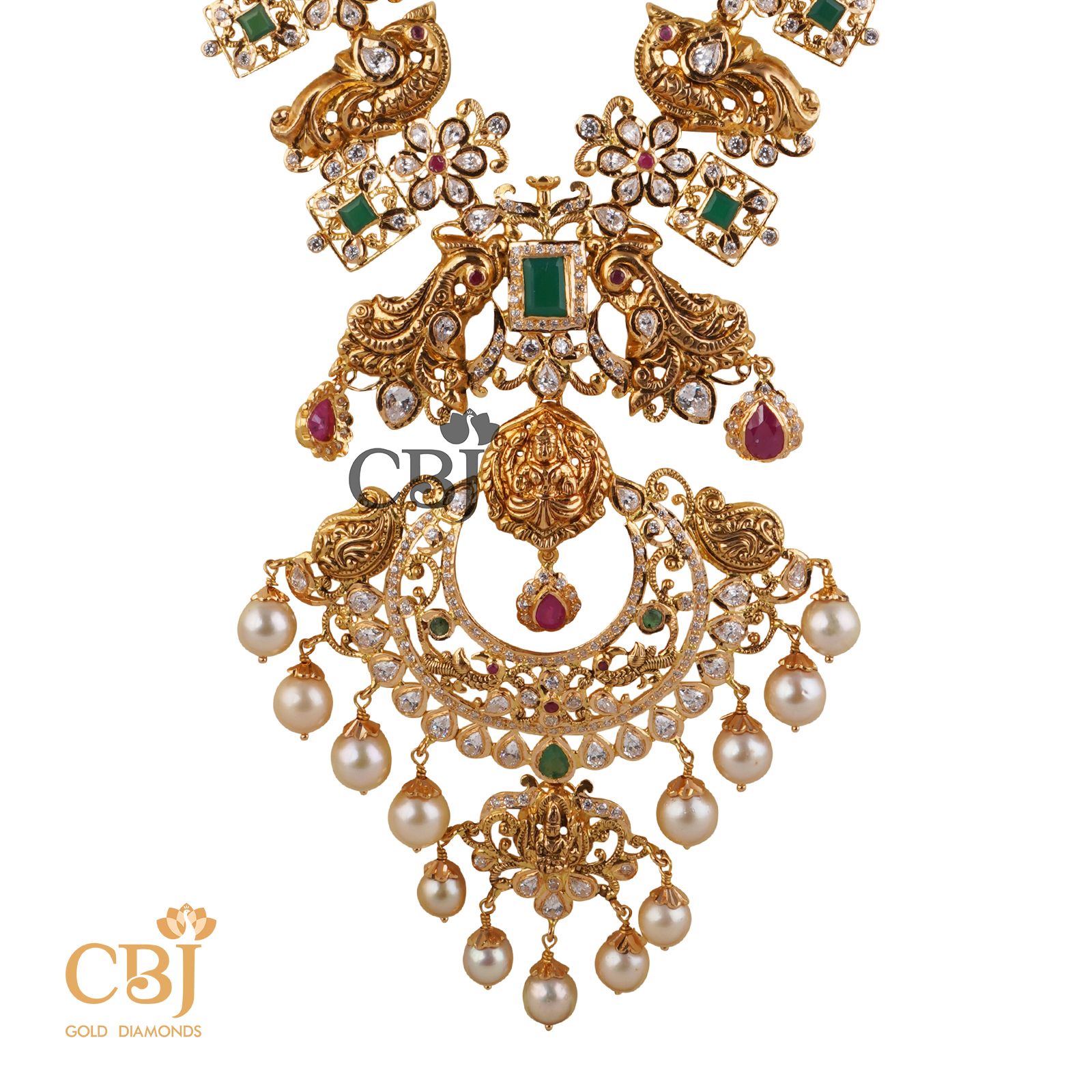 A long CZ pachi haram featuring a peacock design studded with rubies and emeralds.