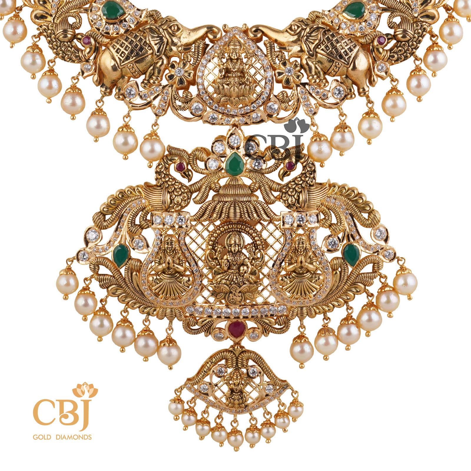 Add grace to your outfit with this grand CZ pachi U haram. A stunning design with a suspended centrepiece.