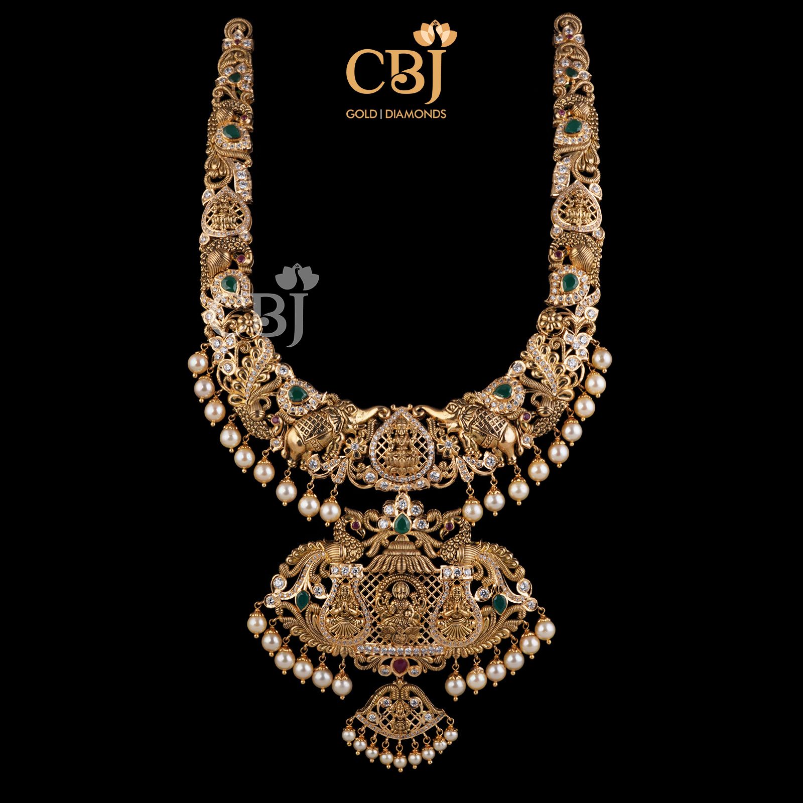 Add grace to your outfit with this grand CZ pachi U haram. A stunning design with a suspended centrepiece. 