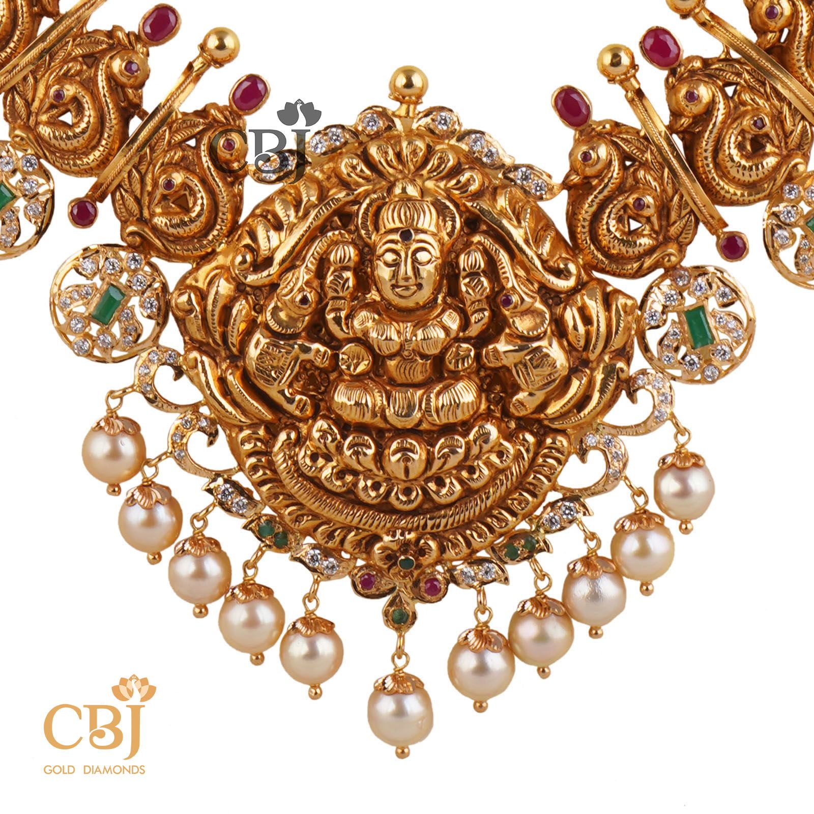 An antique bottumala design featuring rubies