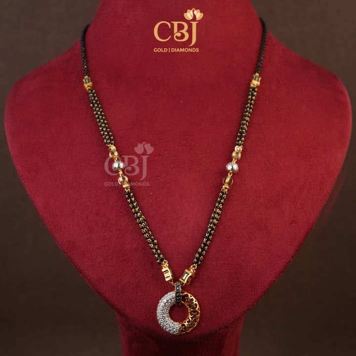 Unique one of a kind mangalsutra design depicting the two-halves that come together to bond.