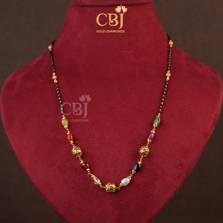 Designs that connect souls. A unique variety of mangalsutra featuring navratna stones.
