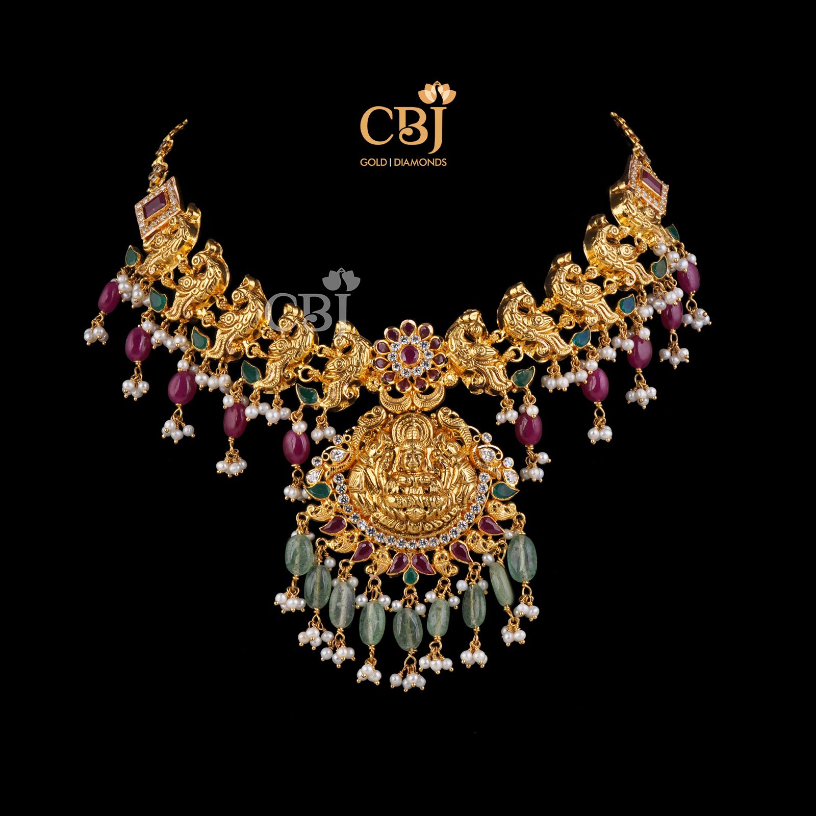 Light weight traditional necklace bejewelled with rubies, emeralds, beads and pearls.