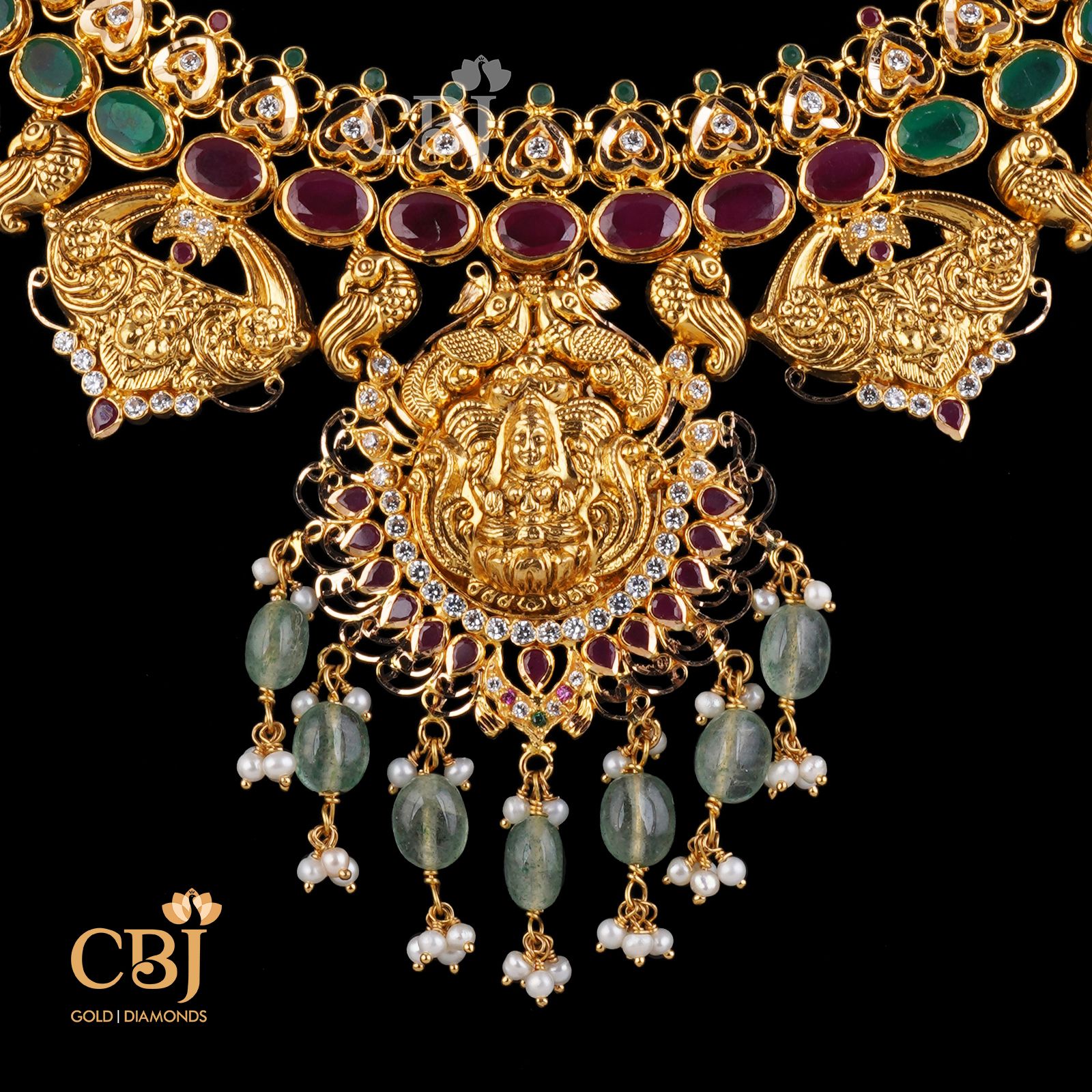 Geometric precision in design comes with years of expertise. A perfect stunning light weight necklace studded with rubies and emeralds.
