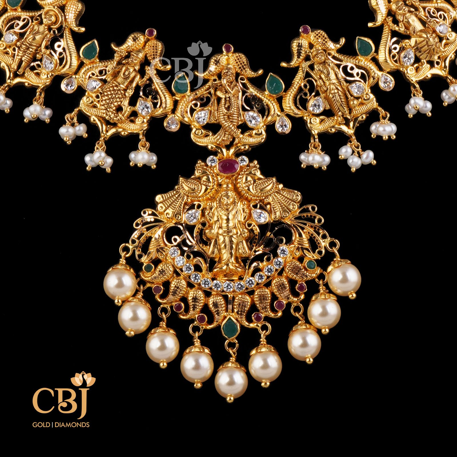 A petite traditional design featuring dasavataram in its design complimented with czs and emeralds.