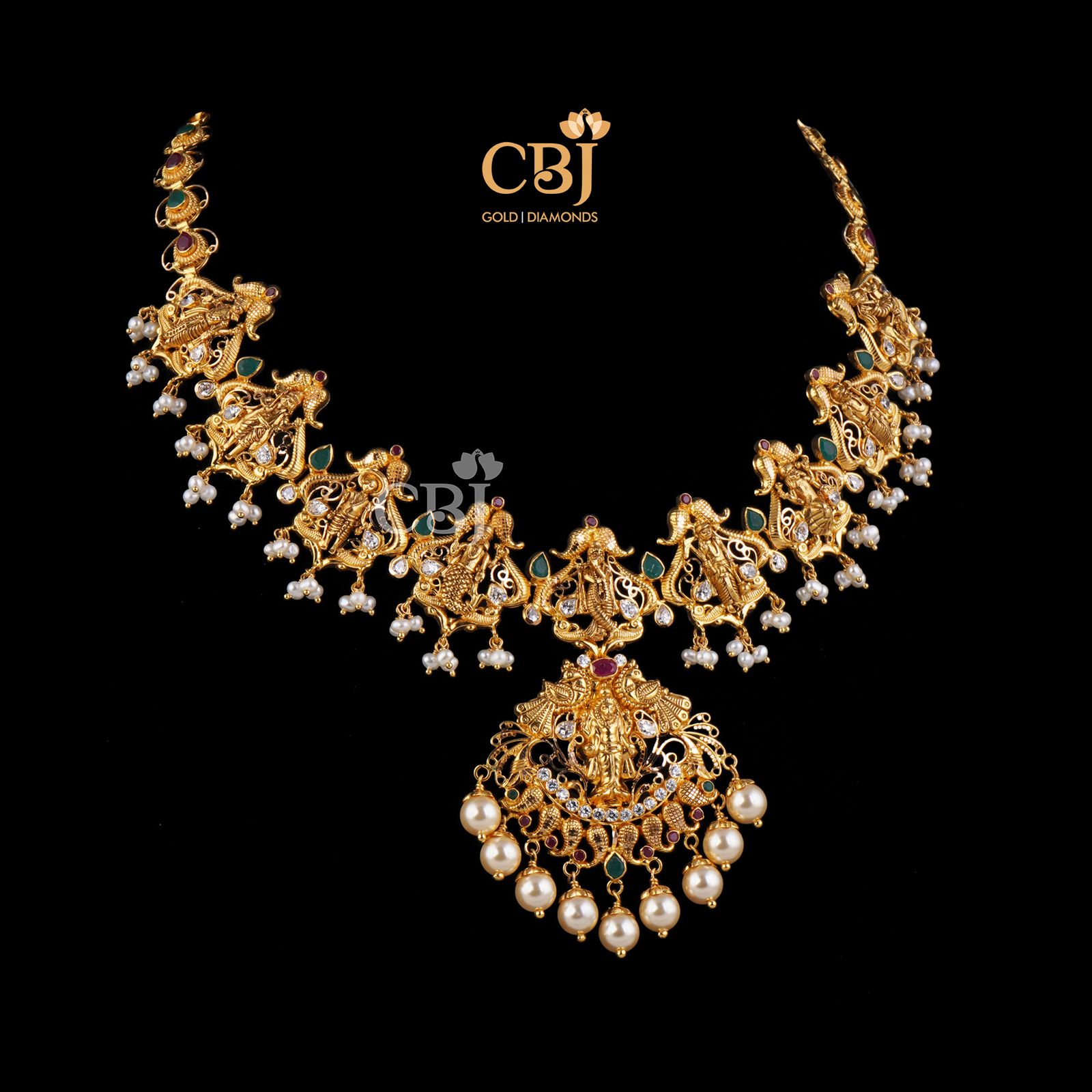 A petite traditional design featuring dasavataram in its design complimented with czs and emeralds.