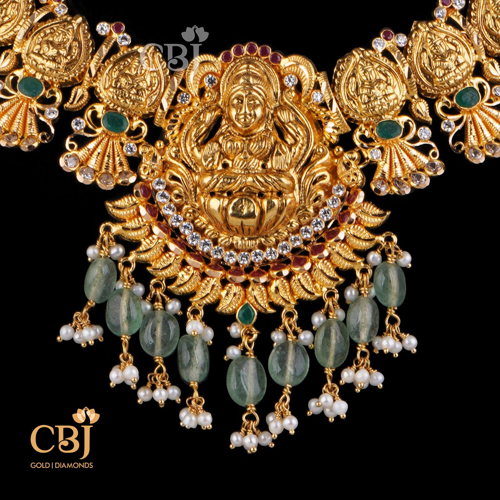A light weight short necklace featuring zambian emeralds.