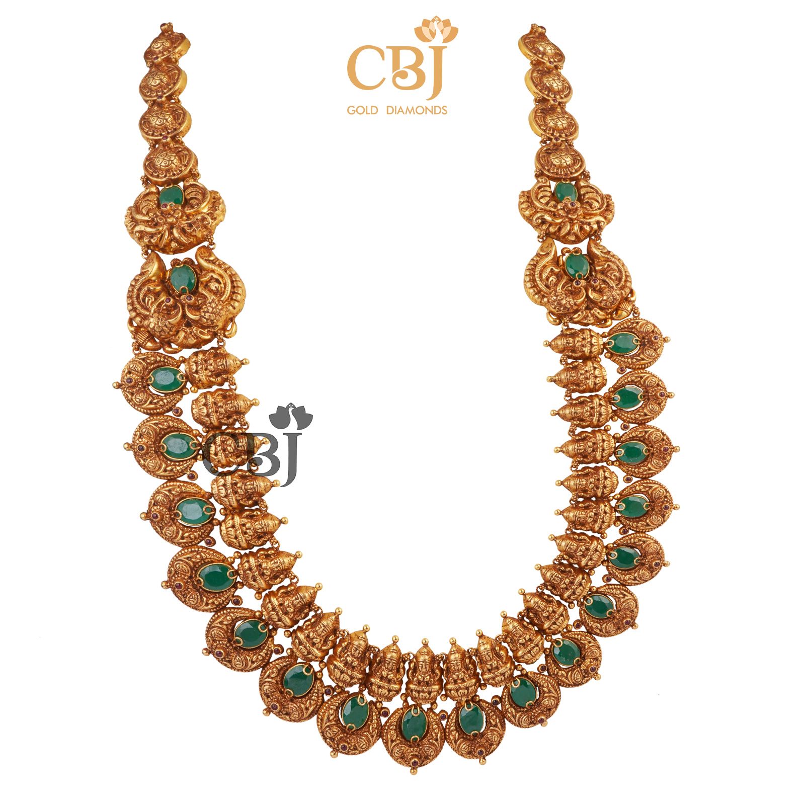 A semi long chand U-haram featuring emerald stones.