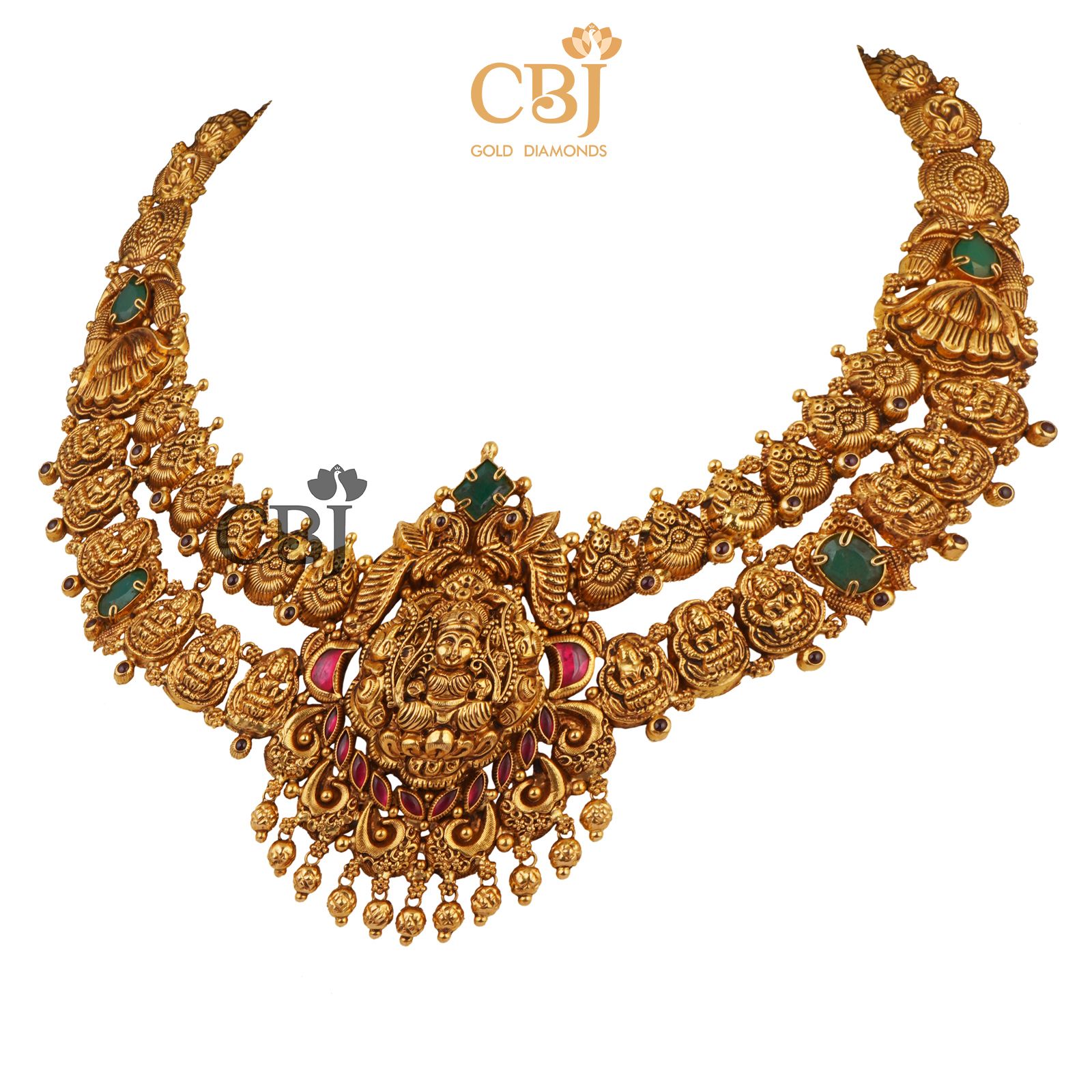 A 2-Step antique nakashi necklace featuring ruby and emerald stones.