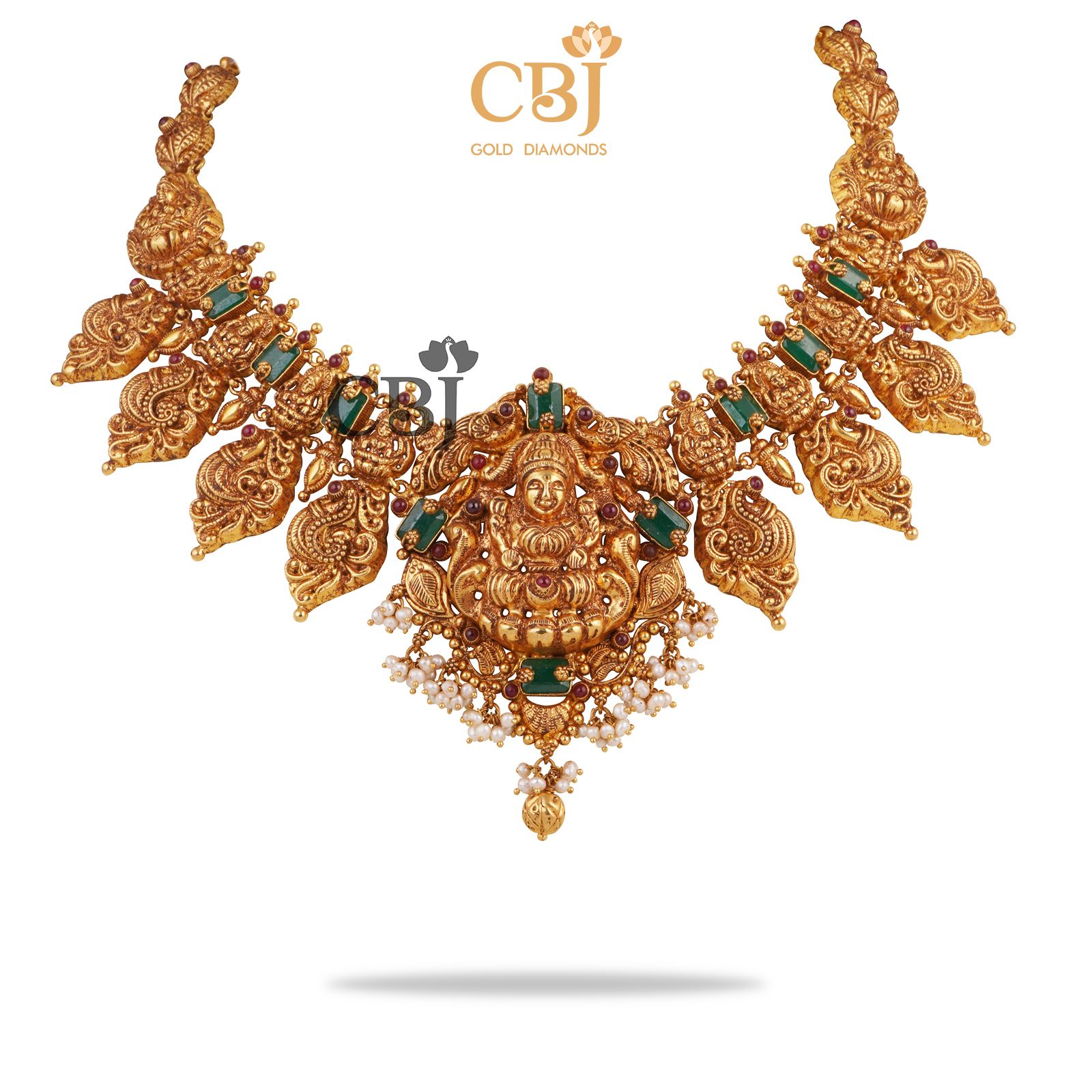 A short Lakshmi haram featuring emeralds and micro pearls.