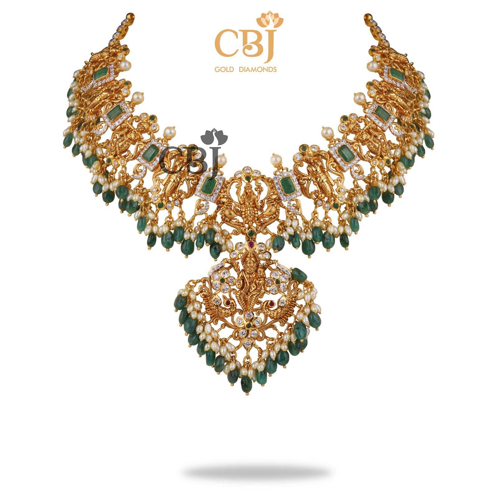 A classic CZ pachi dasavataram necklace  with suspended emerald drops.