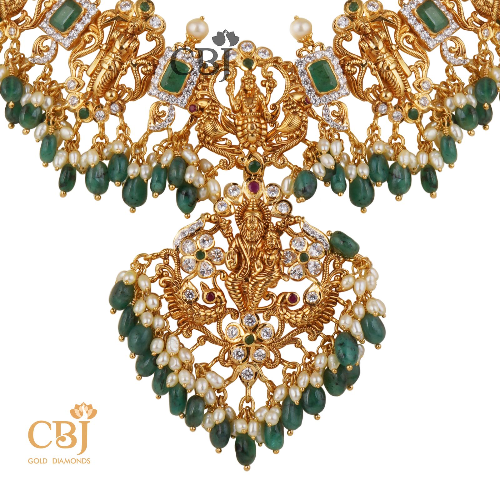 A classic CZ pachi dasavataram necklace  with suspended emerald drops.